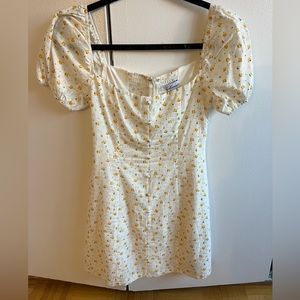 FLORAL SHORT SLEEVE MINI DRESS in a size 2